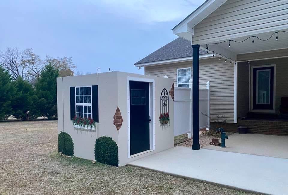 Customer painted storm shelter installation
