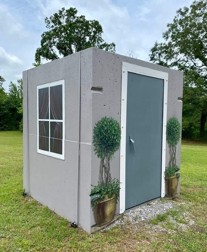Customer painted storm shelter installation