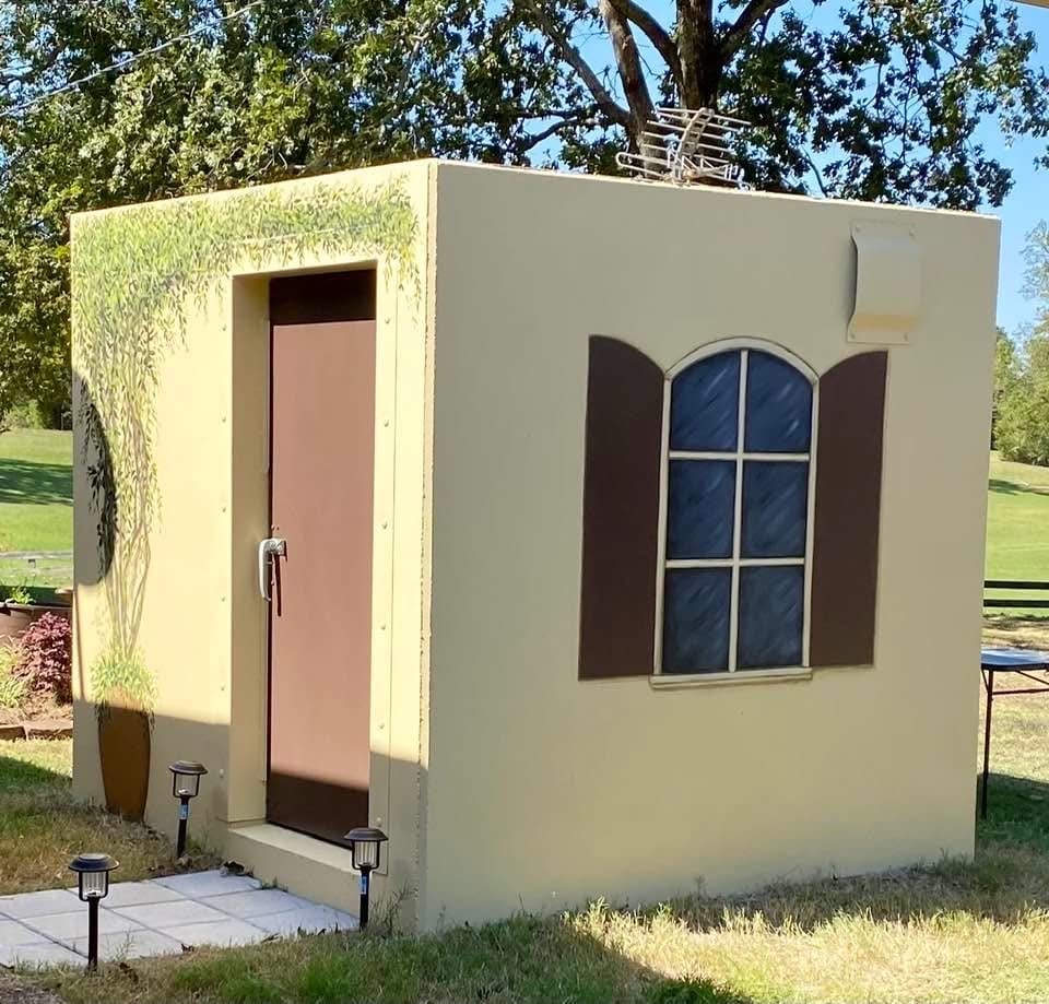 Customer painted storm shelter installation